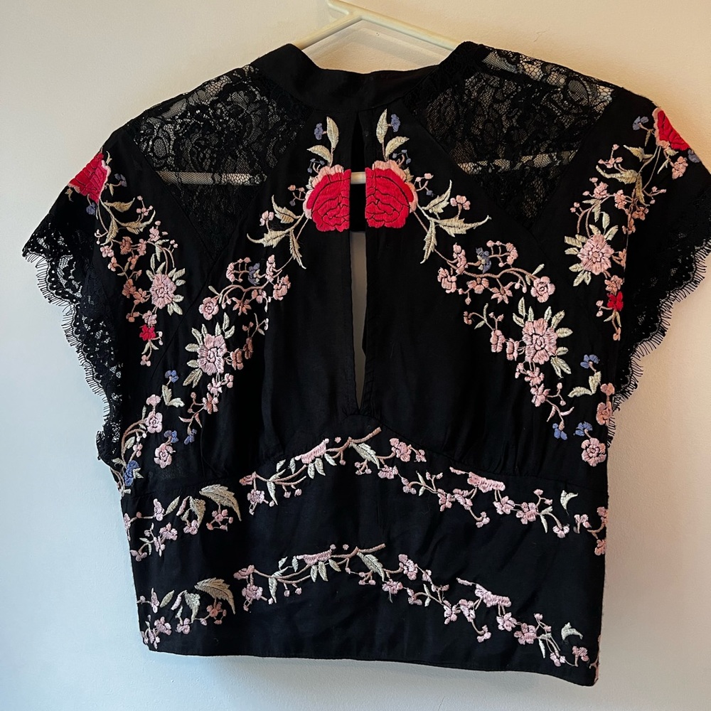 Free people, black rayon top with colorful floral embroidery